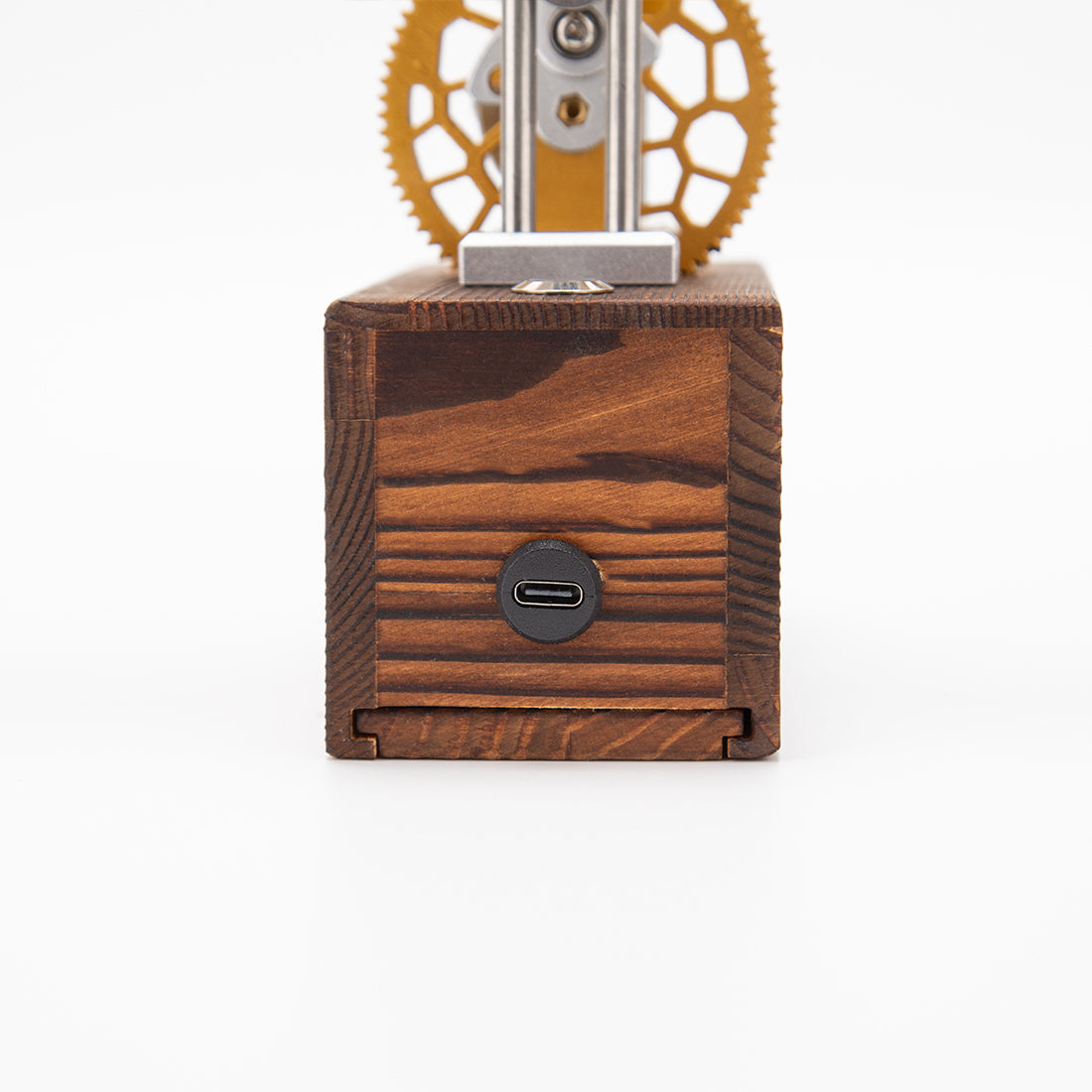 Finished DIY mechanical metal model with flapping wings displayed on desk