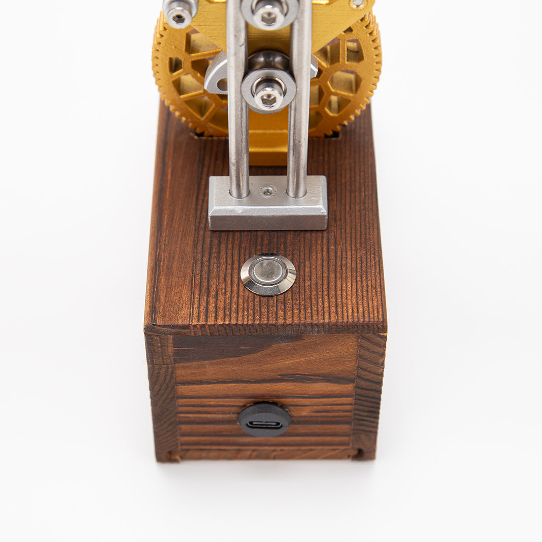 Finished DIY mechanical metal model with flapping wings displayed on desk