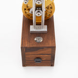 Finished DIY mechanical metal model with flapping wings displayed on desk