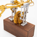 Finished DIY mechanical metal model with flapping wings displayed on desk