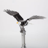 Close-up of aluminum alloy mechanical bird model showing CNC-machined parts, anodized finish and articulated wing structure - VICTMAX