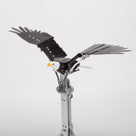 Close-up of aluminum alloy mechanical bird model showing CNC-machined parts, anodized finish and articulated wing structure - VICTMAX