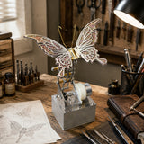 Animated Metal Butterfly Sculpture Displayed on Office Desk and Bookshelf - Victmax